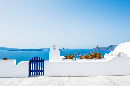 White architecture in Oia town on Santorini island, Greece. Beautiful landscape with sea viewの写真素材