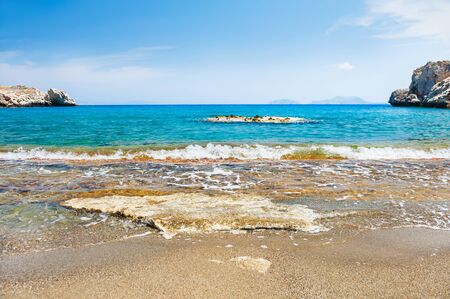 Beautiful beach with clear turquoise water and cliffs. Crete island, Greece.の写真素材