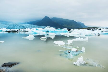 Icebergs in the glacial lake. Vatnajokull glacier, Fjallsarlon lagoon, south Icelandの写真素材