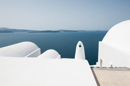 White architecture on Santorini island, Greece. Beautiful landscape with sea viewの写真素材