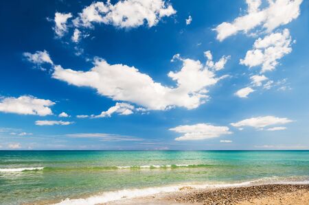 Beautiful beach and blue sky with clouds. Crete island, Greeceの写真素材