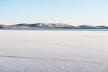 Ice on the frozen lake. Beautiful winter landscapeの写真素材