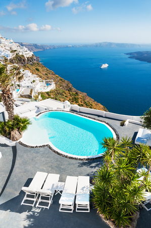 Santorini island, Greece. Beautiful terrace with swimming pool. Summer landscape; sea viewの写真素材