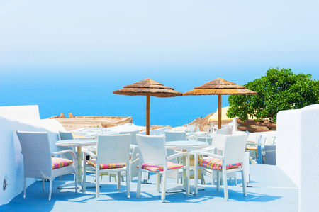 Beautiful terrace overlooking the sea. Santorini island, Greece.の写真素材