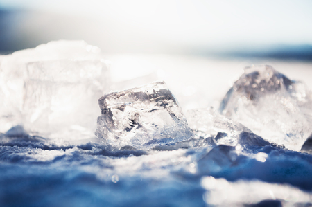 Ice on the frozen lake. Macro image, bokeh effect.の写真素材