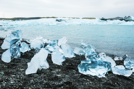 Ice on the coast of Jokulsarlon glacial lagoon, South Iceland. Selective focusの写真素材