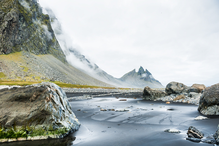 Mountains on the coast of the Atlantic ocean, Icelandの写真素材