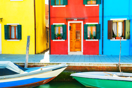 Scenic canal and colorful houses in Burano island near Venice, Italyの写真素材