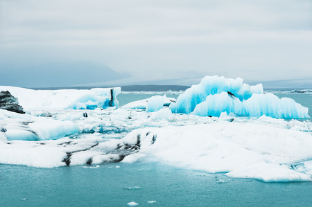 Blue icebergs in Jokulsarlon glacial lagoon, Iceland