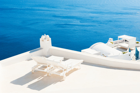 Two sunbeds on the terrace. Santorini island, Greece. Travel and vacationの写真素材