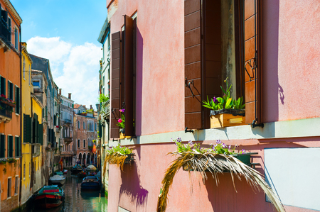 Scenic canal with ancient buildings in Venice, Italy. Selective focusのeditorial素材