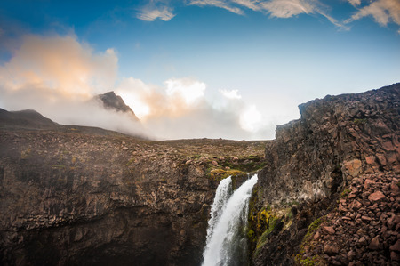 Beautiful waterfall on the Disco island in western Greenlandの写真素材