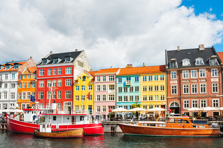 Copenhagen, Denmark - August 18, 2017. Famous Nyhavn pier with colorful buildings and boats in Copenhagen, Denmarkのeditorial素材