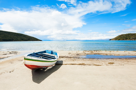 Old wooden boat on the coast of Titicaca lake, Island of Sun (Isla del Sol),  Boliviaの写真素材
