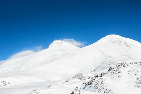 Mount Elbrus, the highest peak of Europe. Caucasus, Russian Federation. Beautiful winter landscapeの写真素材