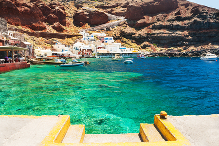 Old port in Oia village on Santorini island, Greece. Summer landscape, sea viewの写真素材