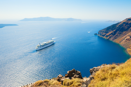 Cruise ship at the sea near the Greek Islands. Santorini island, Greece.の写真素材