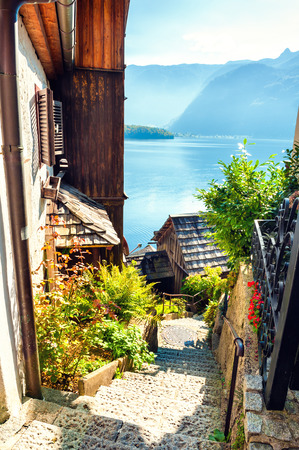 Beautiful street in Hallstatt village, view of Hallstatter lake, Austrian Alpsの写真素材