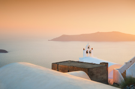 Beautiful sunset on Santorini island, Greece. Summer landscape, sea viewの写真素材