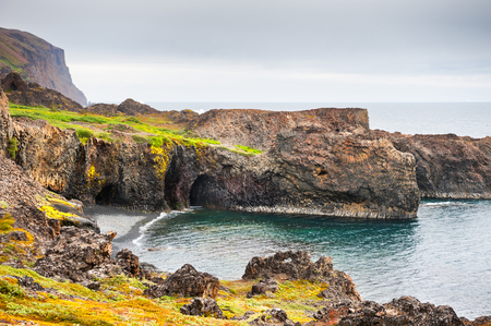 Basalt cliffs on the coast of Disco island, western Greenlandの写真素材