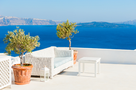 White architecture on Santorini island, Greece. Beautiful terrace with sea view.の写真素材