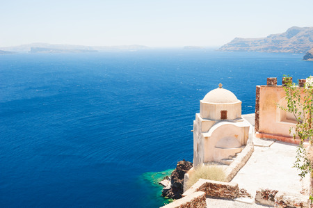 Old church on Santorini island, Greece. Beautiful summer landscape, sea view.の写真素材
