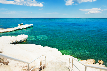 Governor beach with white cliff and blue sea in Cyprusの写真素材
