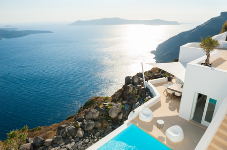 White architecture on Santorini island, Greece. Beautiful summer landscape, sea view.の写真素材