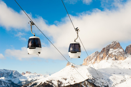 Ski lift in Val di Fassa ski resort in winter Dolomites, Italyの写真素材