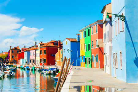 Scenic canal with colorful buildings in Burano island, Venice, Italyの写真素材
