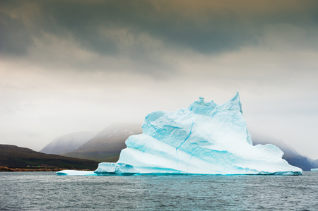 Big beautiful iceberg floating near Disco island, western Greenlandの写真素材