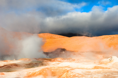 Geysers and fumaroles Sol de Manana at sunrise, Altiplano, Boliviaの写真素材