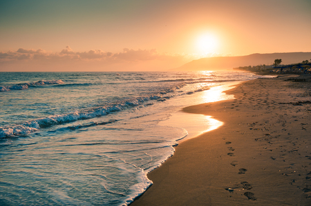 Sunrise on the beach. Crete island, Greeceの写真素材