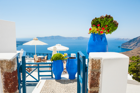 White-blue architecture and blue sea, Santorini island, Greece. Beautiful summer landscape, sea view.の写真素材
