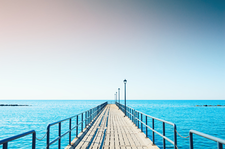 Wooden pier on the sea shore in Limassol, Cyprusの写真素材