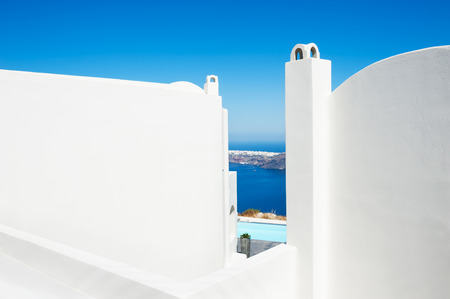 White architecture on Santorini island, Greece. Beautiful summer landscape, sea view.の写真素材