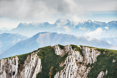 Mountains in foggy morning. Austrian Alps. Summer landscapeの写真素材