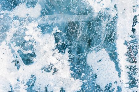 Ice on the frozen lake. Macro image, selective focus. Beautiful winter backgroundの写真素材