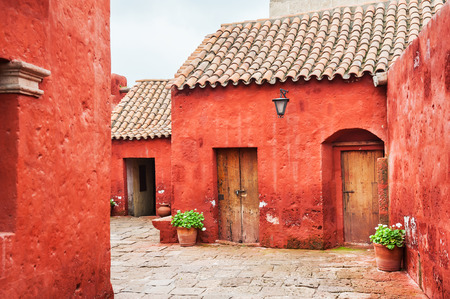 Red walls in Santa Catalina monastery in Arequipa, Peruの写真素材