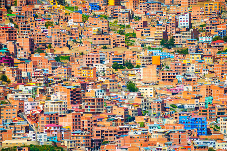 Traditional bolivian houses on the hills in La Paz city, Boliviaの写真素材