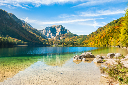 Beautiful lake in the Alps mountains in autumn. Vorderer Langbathsee lake in Austriaの写真素材