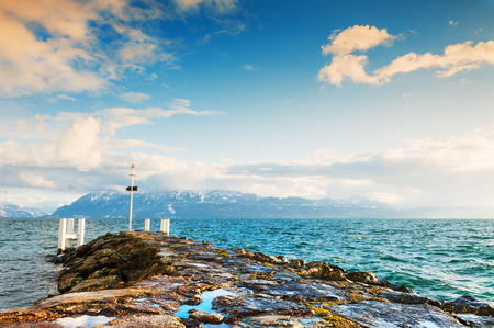 Pier on the shore of Lake Geneva in Lausanne, Switzerlandの写真素材