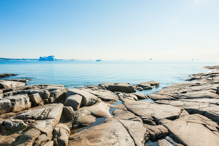 Rocky coast of Atlantic ocean in western Greenlandの写真素材