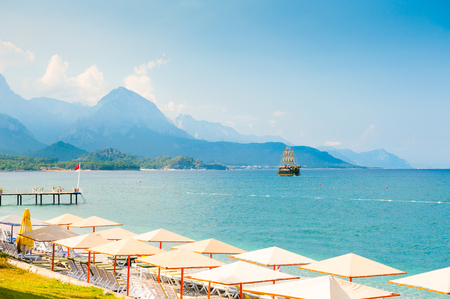 Beautiful beach with blue sea and mountains in Kemer, Turkey. Travel and vacationの写真素材