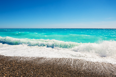 Beautiful beach with turquoise sea in Nice, France.の写真素材