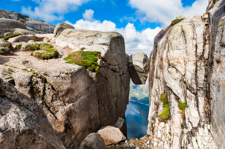 Kjeragbolten - famous landmark on Kjerag mountain, Norway. Summer landscapeの写真素材