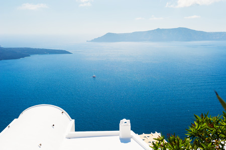 White architecture on Santorini island, Greece. Beautiful summer landscape, sea view.の写真素材