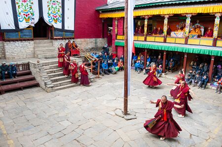 Tengboche, Nepal - October, 24, 2018: The monks perform religious buddhistic dance during the Mani Rimdu festival in Tengboche Monasteryのeditorial素材