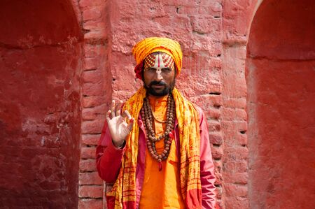 Kathmandu, Nepal - October, 20, 2018: Sadhu holy man in traditional clothes in Pashupatinath Temple in Kathmandu, Nepalのeditorial素材
