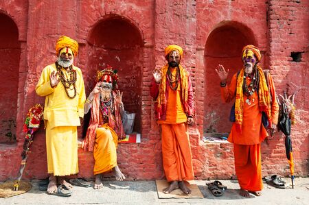 Kathmandu, Nepal - October, 20, 2018: Four Sadhu holy men in traditional clothes in Pashupatinath Temple in Kathmandu, Nepalのeditorial素材
